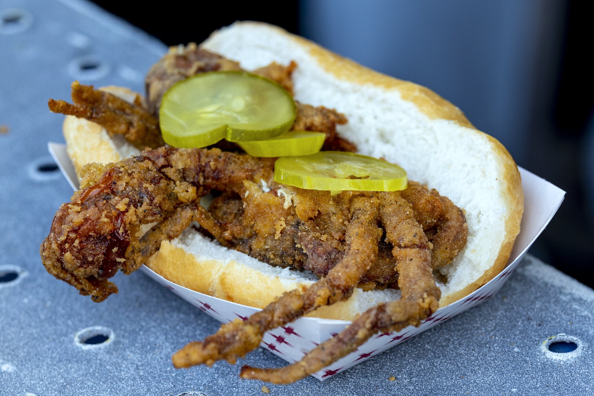 Seafood sandwich with pickles at New Orleans Jazz Fest.