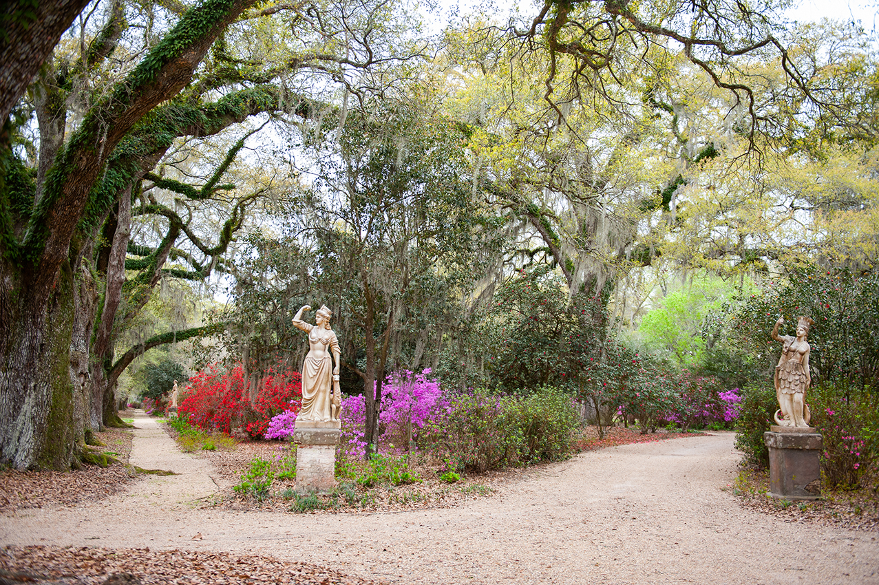 A wide-lens photo of the gardens at Rosedown State Historic Site.