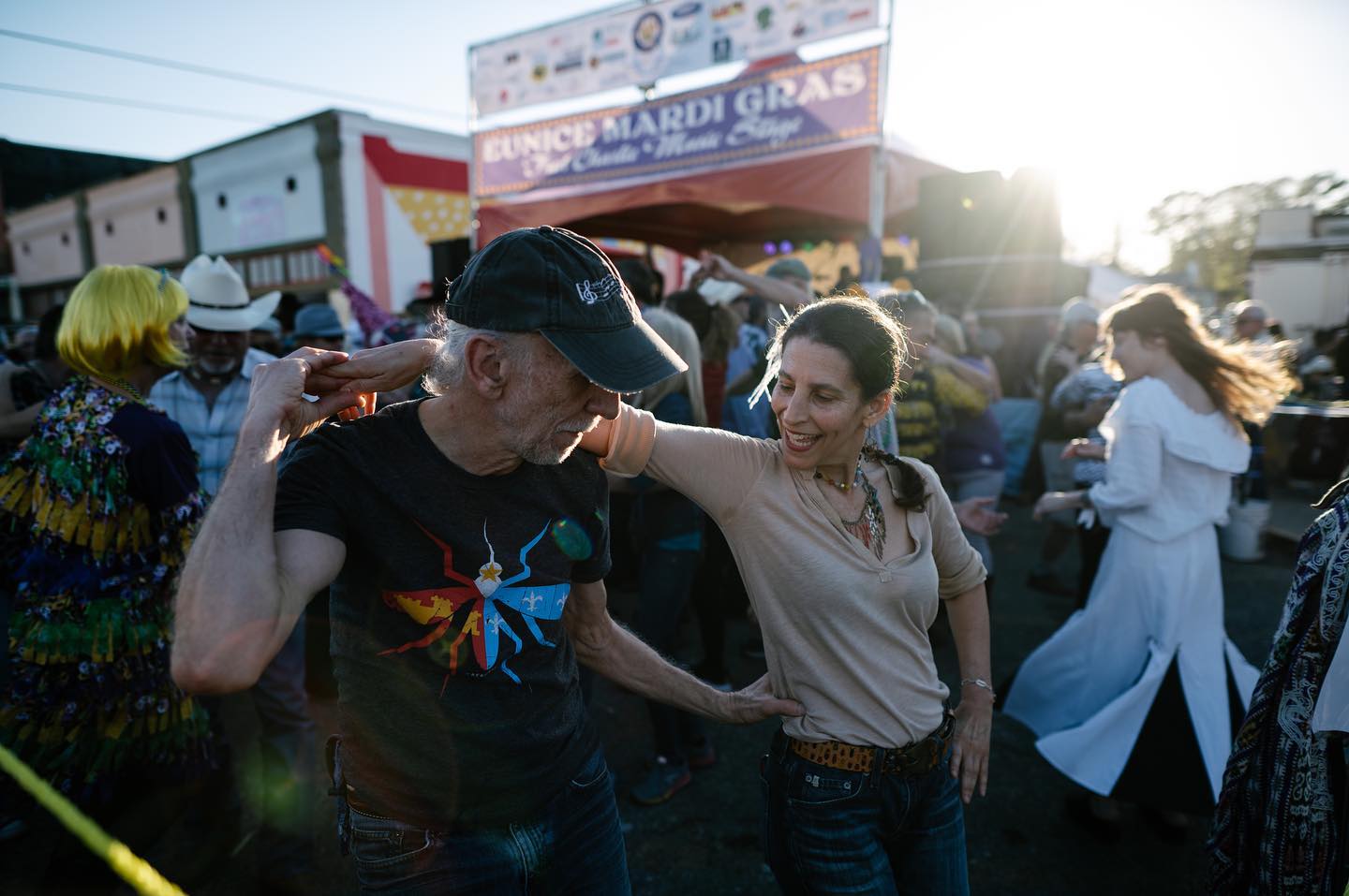 Two people dance at a Mardi Gras celebration in Eunice, Louisiana.